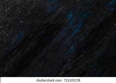 La textura de mármol negro oscuro con un patrón natural se puede utilizar como fondo para mostrar o montar sus productos