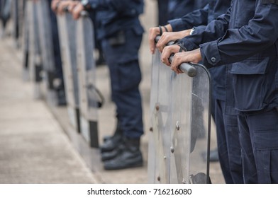 Police riot used shields and batons to practice outdoors.