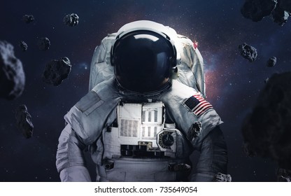 素晴らしい宇宙背景で宇宙遊泳をしている宇宙飛行士の写真。深宇宙のイメージ、壁紙や印刷に最適な高解像度のSFファンタジー。NASA から提供されたこの画像の要素