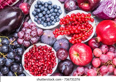 赤と紫の果物と野菜の食品背景平面図です。