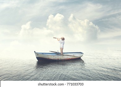 business man on a boat watching the future with binoculars