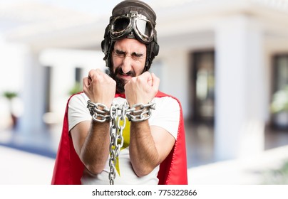 young super hero with a steel chain