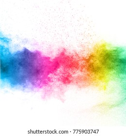 The explosion of multi colored powder. Beautiful rainbow color powder fly away. The cloud of glowing color powder on white background