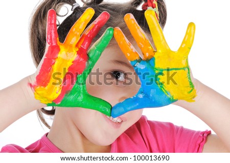 Smiling girl making triangle with her painted palms
