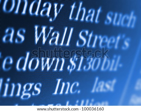 Wall street text on a computer screen. Selective focus.