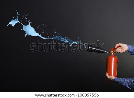 Splashes of paint from the nozzle of the extinguisher.