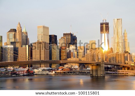 Lower Manhattan in the background of Brooklyn Bridge in a sunny morning, New York, United States