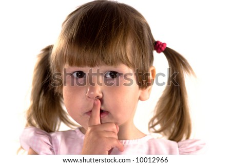 Little girl making sign of silence isolated on white