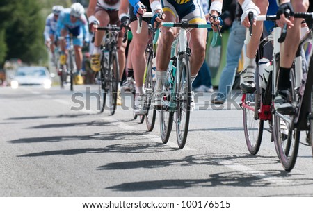 group of cyclist at professional race Royalty-Free Stock Photo #100176515