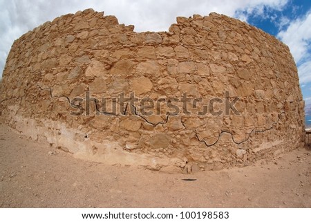 Fisheye view of ancient fortress ruin in the desert near the Dead Sea