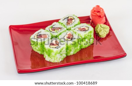Tobiko Spicy Maki Sushi - Hot Roll with various type of Tobiko (flying fish roe) outside. Tuna, avocado and Green Lettuce inside