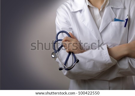 Doctor with a stethoscope in the hands behind the back