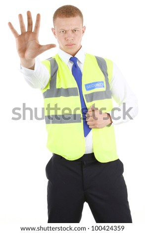 Security guard with a stop gesture, isolated on white