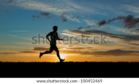 jogger in sunset Royalty-Free Stock Photo #100452469