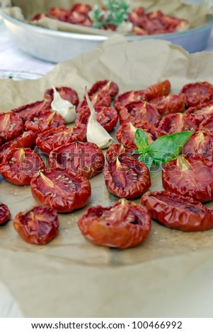 Homemade dried red tomatoes closeup