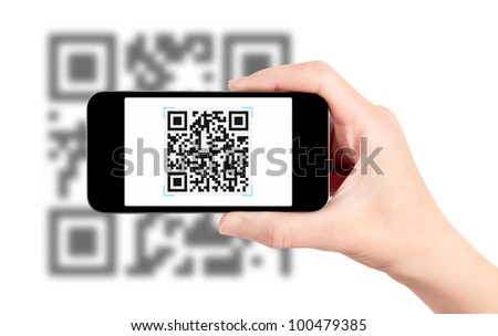 Scanning quick response code pattern with mobile smartphone. Isolated on white.