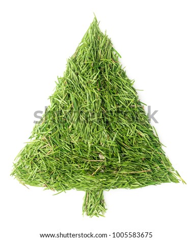 Christmas tree made of needles on isolated white