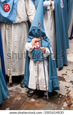 Picture of a child penitent of the holy week of Seville, Spain.
