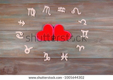 heart. felt. wooden background. lovers. Zodiac signs. horoscope. unusual handwork