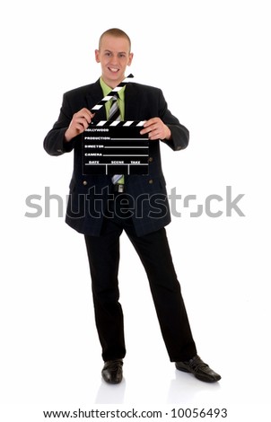 Handsome young successful businessman,  with movie clapper, white background,  studio shot.