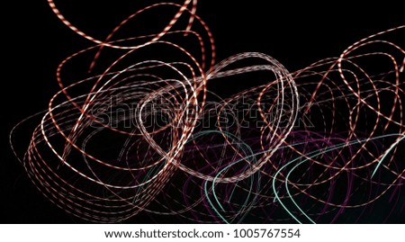 Rolling effect. Motion blur. Abstract painting color. Wild light pattern. Fractal chart art design. Creative photography of exposure. Abstract light at night