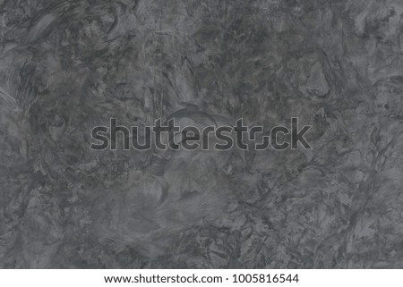 Abstract background. Rough dark gray texture of concrete or cement wall background, close up
