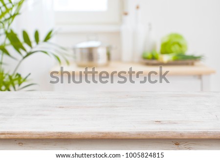 Table top and blurred kitchen room as background Royalty-Free Stock Photo #1005824815