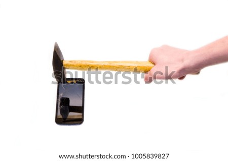 the hand with the hammer splits the phone on white background