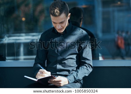  business man with documents on building background, work                              