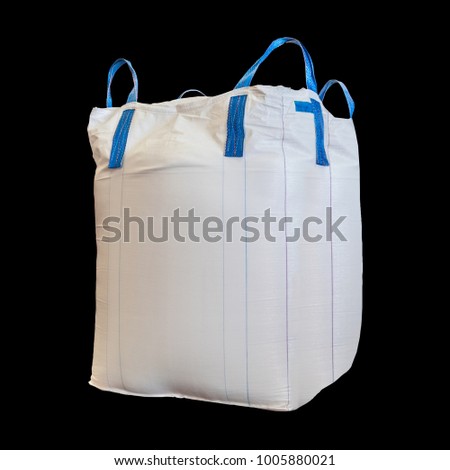 Jumbo bag of white sugar isolated on black background with clipping path. Royalty-Free Stock Photo #1005880021