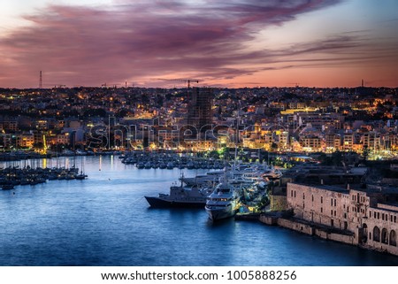 Malta: Manoel Island, Il-Gzira and Marsans Harbour. View from city walls of Valletta at sunset