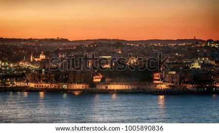 alta: Il-Gzira and Marsans Harbour. Aerial view from city walls of Valletta at sunset