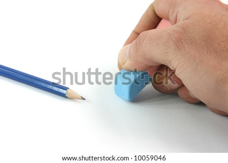 business concepts closeup  erasing mistakes and black pencil isolated on white background
