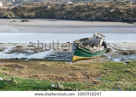 This is a picture of a wrecked fishing boat that has been abandon on the Cruit Island in Donegal Ireland.  It was taken on a bight cold January day in 2018. 