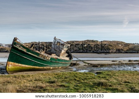 This is a picture of a wrecked fishing boat that has been abandon on the Cruit Island in Donegal Ireland.  It was taken on a bight cold January day in 2018. 