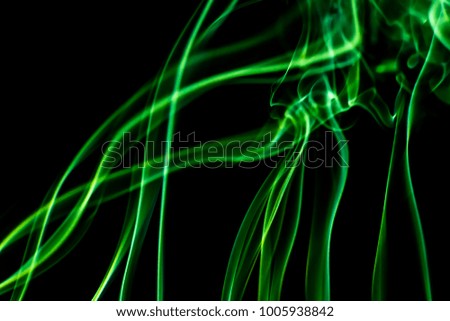 Movement of green smoke background. Abstract of smoke on black background, smoke background ,green smoke background.
