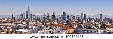 Milan, new panoramic skyline. The picture was taken from the Duomo cathedral and shows the new buildings from the Garibaldi district. The alps, less than 50 miles away, are on the background.