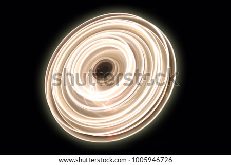 Neon circles at long exposure shot. Neon color lights abstract painting . Abstract lights at motion exposure time slow shutter speed effect.