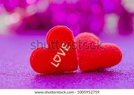 Red heart has the message "love" shape on the background. Light abstract music in love concept for Valentine's Day with sweet and romantic moments.Pictures for Valentine's Day