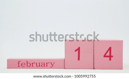 Text february 14th on wooden cube calender at the low of image on white background with copy space, Concept the Valentine's Day.