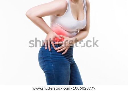 Woman with abdominal pain, stomachache on white background, studio shot
