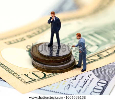 Businessman leader and finance adviser figurines. USA banknote and coin. Business agreement profit. Successful business strategy. Market share growth by merge and acquisitions. Career and leadership