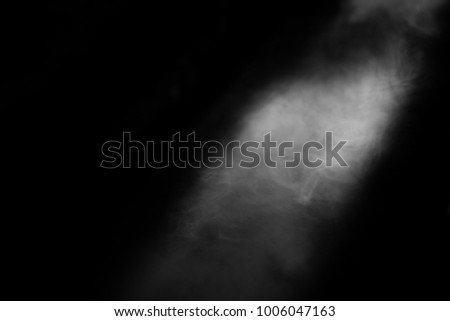 Abstract smoke moves on a black background
