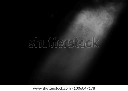 Abstract smoke moves on a black background
