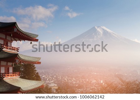 Fuji mountain with behind red pagoda and residence downtown aerial view, Japan