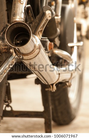 Vintage motorcycle exhaust.
