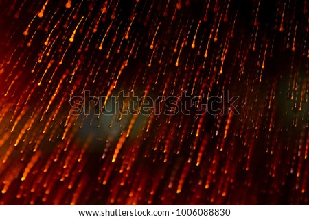 Abstract Orange Colour Light Motion Over Dark Background. Slow Shutter Speed , With Motion Blur Effect To Show Fast Movement