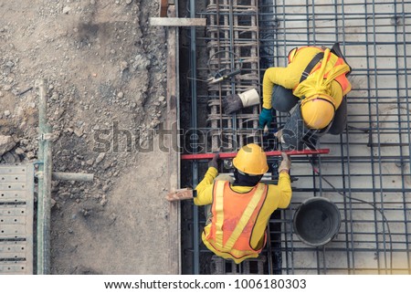 aerial view of construction worker in construction site Royalty-Free Stock Photo #1006180303