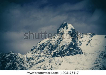 Kullu Valley in the Himalayan Mountains. Himachal Pradesh state, India.
Snowy mountains peak. Head of a mountain