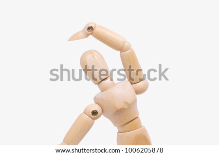 wooden Figure Wondering or Confused on white background